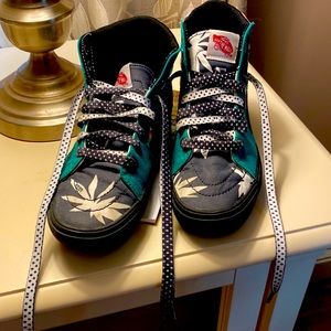 Custom designed Vans by my Daughter when she was 9. She wore them twice!